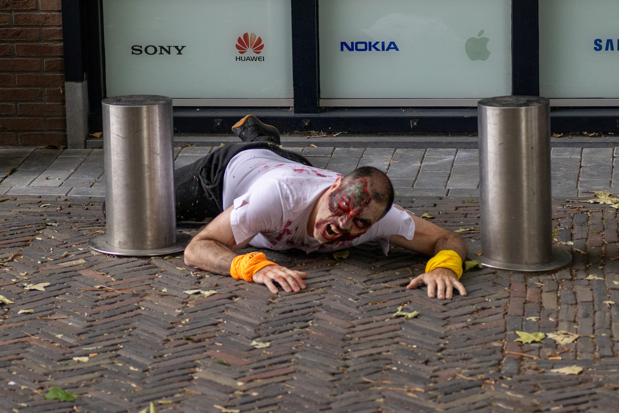 Zombie crawling through city streets